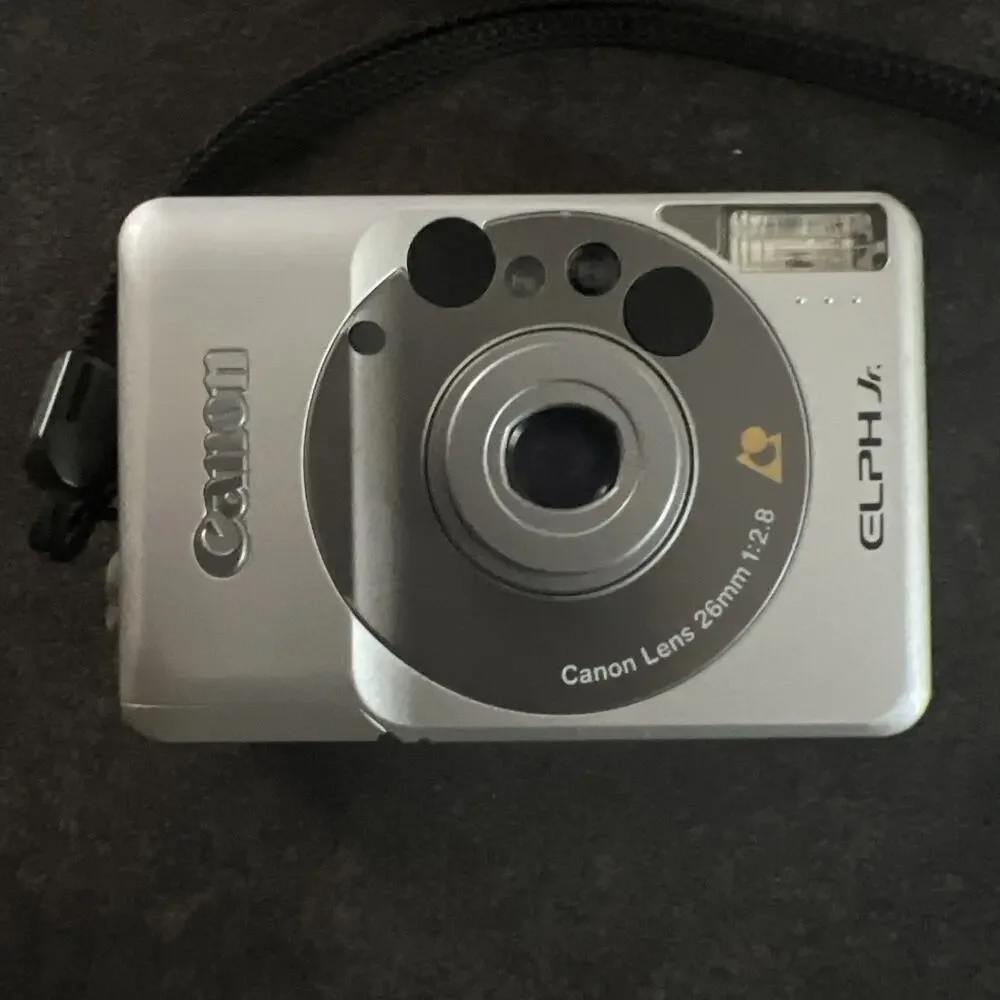 Canon Elph Jr Handheld Built-in Flash 26mm APS Film Camera With Battery Included